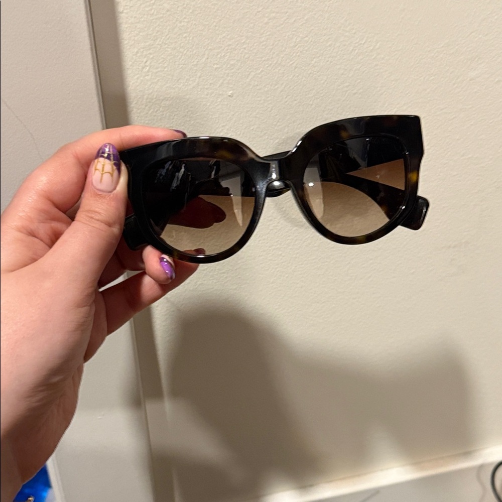 Prada tortoiseshell sunglasses
